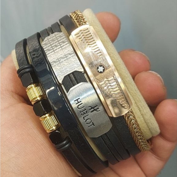 دستبند چرمی قفل و پلاک استیل مردانه طرح مهره ای کیفیت چرم عالی تنوع طرح رنگ ثابت کد bn (پس کرایه)