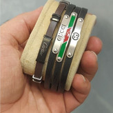 دستبند چرمی قفل و پلاک استیل مردانه کارتیر Cartier کیفیت چرم عالی تنوع طرح رنگ ثابت کد bn (پس کرایه)