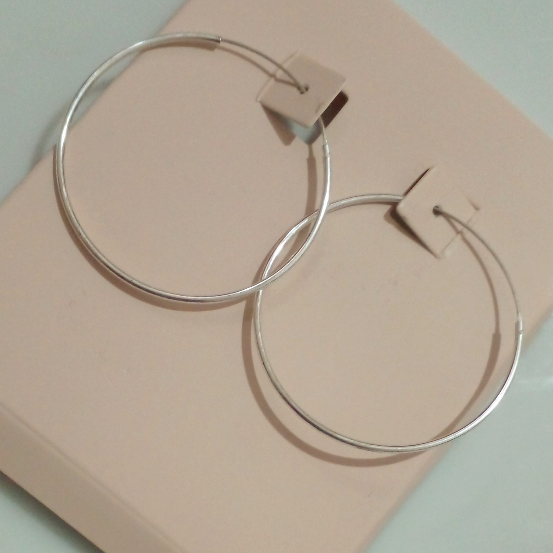 گوشواره حلقه ایی نقره با حک عیار 925 از برند sterling silver